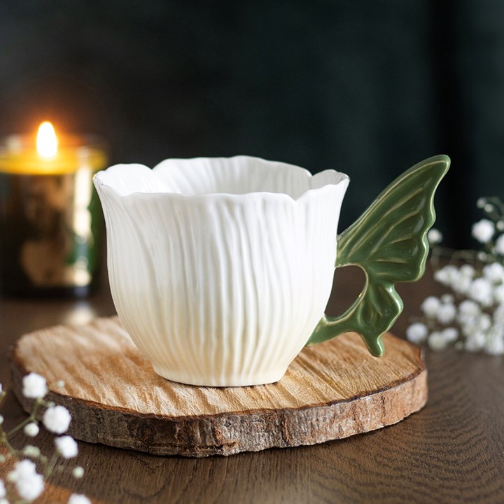 
                  
                    Flower Fairy Wing Teacup with sculpted fairy wing handle
                  
                