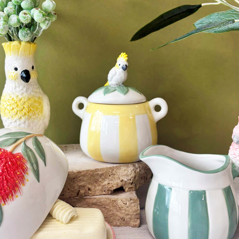 
                  
                    Urban Products Cocky Canister styled with other cockatoo-themed homewares
                  
                