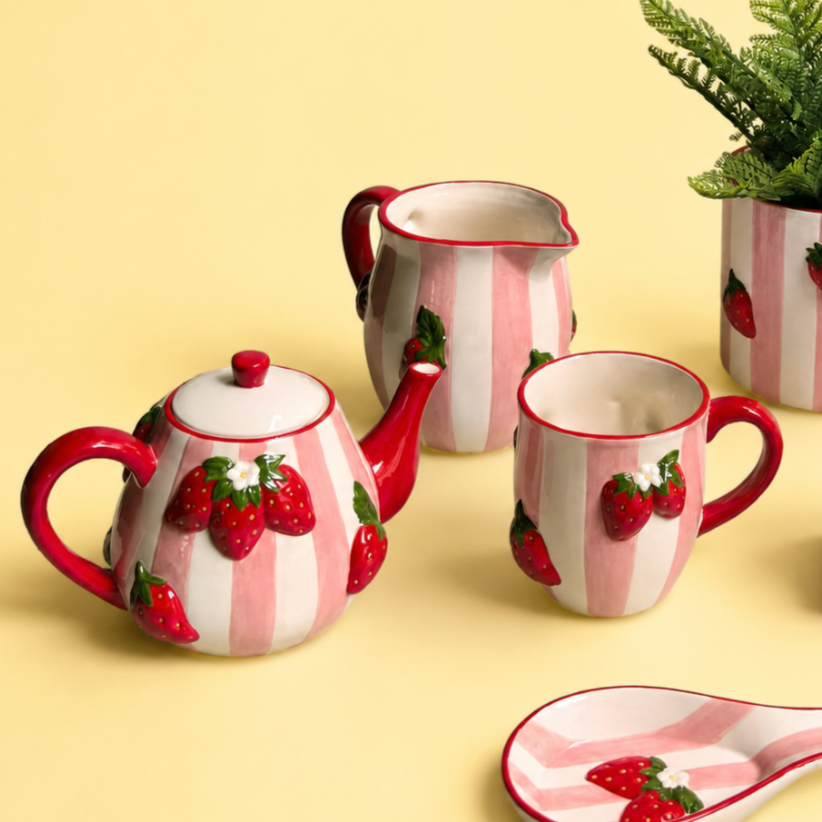 
                  
                    Urban Products Strawberry Delight tea set with teapot, jug, mug and spoon rest
                  
                